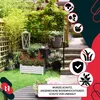 A garden scene with a wooden planter box filled with flowers, a pathway, and decorative elements. Produktbild-Vorschau