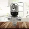 A close-up of a thermostatic mixing valve with a kitchen background. Podgląd zdjęcia produktu