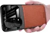 A hand holding a smartphone case.