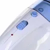A close-up view of the controls and indicator light on a white and blue handheld vacuum cleaner. Podgląd zdjęcia produktu
