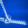 A glass of water with LED lights submerged in it, with more LED lights laid out on a reflective surface. Produktbild-Vorschau