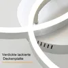 A close-up view of a modern LED ceiling light with two rings. Podgląd zdjęcia produktu