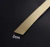 A close-up shot of a gold metal strip on a black background, with a measurement indicator. Podgląd zdjęcia produktu