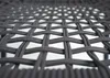 A close-up view of the woven rope material of a garden chair. Produktbild-Vorschau