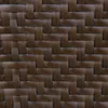 A close-up view of a woven polyrattan material. Voir les images du produit