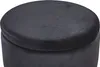 A close-up view of a round, black velvet pouf with a lid. Náhled obrázku produktu