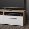 A close-up view of a modern TV stand with a DVD player and a drawer. Náhľad obrázku produktu