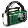 A green emergency radio with a flashlight and a handle, shown against a white background. Produktbild-Vorschau