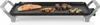 A tabletop electric grill with food on it, set against a white background. Voir les images du produit