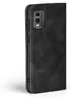 A black flip case for a smartphone, shown from the side with the camera cutout visible. Produktbild-Vorschau