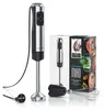 A hand blender, its packaging, and accessories are displayed on a white background. The hand blender is silver and black, with buttons on the handle. The packaging shows images of food and the product name. A whisk attachment is also visible. Produktbild-Vorschau