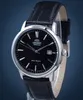 A close-up studio shot of an Orient Bambino automatic watch with a black dial and black leather strap, set against a blue background. Voir les images du produit