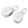 Two stainless steel pulleys are shown against a white background. Voir les images du produit