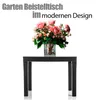 A black side table with a vase of pink roses on top, set against a white background. Produktbild-Vorschau