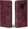 A burgundy flip case for a smartphone is shown from two angles. Produktbild-Vorschau