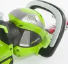Close-up of the handle and motor housing of a Greenworks hedge trimmer. Podgląd zdjęcia produktu