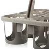 A close-up view of a plastic bottle carrier with a handle. Produktbild-Vorschau