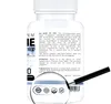 A close-up view of a white bottle of dietary supplements, with text and certifications visible. Náhled obrázku produktu