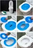 A collage of images showing a blue toilet training seat for cats being placed on and removed from a toilet. Produktbild-Vorschau