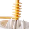 Close-up of a kitchen gadget with a spiral mechanism and white prongs. Náhled obrázku produktu
