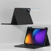 Two views of a black tablet case with an attached keyboard, one showing the back and the other showing the front with the screen on. Produktbild-Vorschau