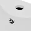 A close-up view of a white ceramic sink, showing a drain with a silver grate and an overflow hole. Produktbild-Vorschau