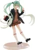 A figurine of Hatsune Miku in a school uniform, holding a book. Podgląd zdjęcia produktu