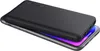 A black power bank is placed on top of a smartphone. Produktbild-Vorschau