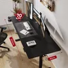 A modern black standing desk with dual monitors, a keyboard, mouse, and a plant. Podgląd zdjęcia produktu