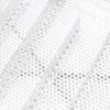 A close-up, abstract view of a perforated metal surface with a repeating pattern of raised ridges. Náhľad obrázku produktu