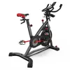 A stationary exercise bike against a white background. Voir les images du produit