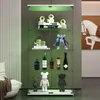 A modern glass display cabinet with LED lighting, showcasing various collectibles and bottles. Podgląd zdjęcia produktu