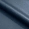 A close-up view of folded navy blue fabric, likely upholstery or a textile material. Náhľad obrázku produktu