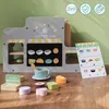 A wooden coffee and ice cream bar playset with various accessories laid out on a wooden surface. Anteprima dell’immagine prodotto