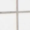 A close-up view of a white room divider with a grid pattern. Náhled obrázku produktu