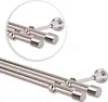 A close-up view of a double curtain rod with end caps. Podgląd zdjęcia produktu