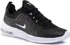 A studio shot of a black and white Nike Air Max Axis shoe. Voir les images du produit