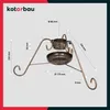 A product shot of a metal Christmas tree stand with dimensions indicated by lines and text. Náhled obrázku produktu