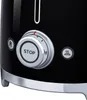 Close-up of a black SMEG toaster with silver controls and icons. Náhľad obrázku produktu
