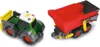 A green tractor toy with a yellow loader and a red trailer toy are shown side-by-side on a white background. Produktbild-Vorschau