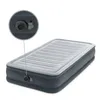 An inflatable air mattress with a built-in pump is shown against a white background. A close-up inset highlights the pump mechanism. Náhled obrázku produktu
