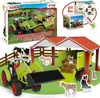 A collage of a CLAAS Advent calendar toy set with a tractor, farm animals, and a barn. Anteprima dell’immagine prodotto