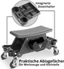 A black rolling stool with integrated storage compartments and cup holders, shown with a close-up inset of the storage tray. Náhled obrázku produktu