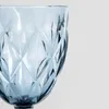 A close-up of a blue glass with a diamond pattern. Podgląd zdjęcia produktu