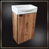 A bathroom vanity with a sink and a wooden cabinet. Podgląd zdjęcia produktu