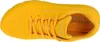 A top-down view of a yellow Skechers sneaker. Podgląd zdjęcia produktu