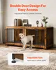 A dog is standing in front of a wooden dog crate furniture piece. There are text overlays highlighting features. Náhľad obrázku produktu