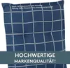 A close-up of a blue cushion with a white grid pattern, with text overlays describing the product's material and quality. Produktbild-Vorschau