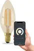 A smart LED light bulb is shown next to a hand holding a smartphone displaying the control app. Produktbild-Vorschau
