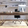 A home office desk with a computer, lamp, and chair, with a floor mat underneath the chair. Produktbild-Vorschau